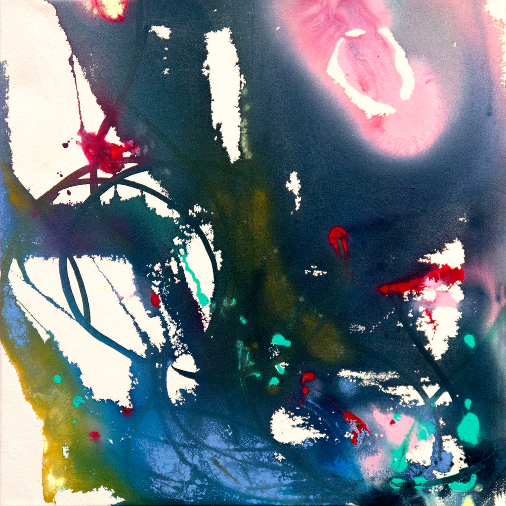 Abstract artwork with splashes of color on a dark background